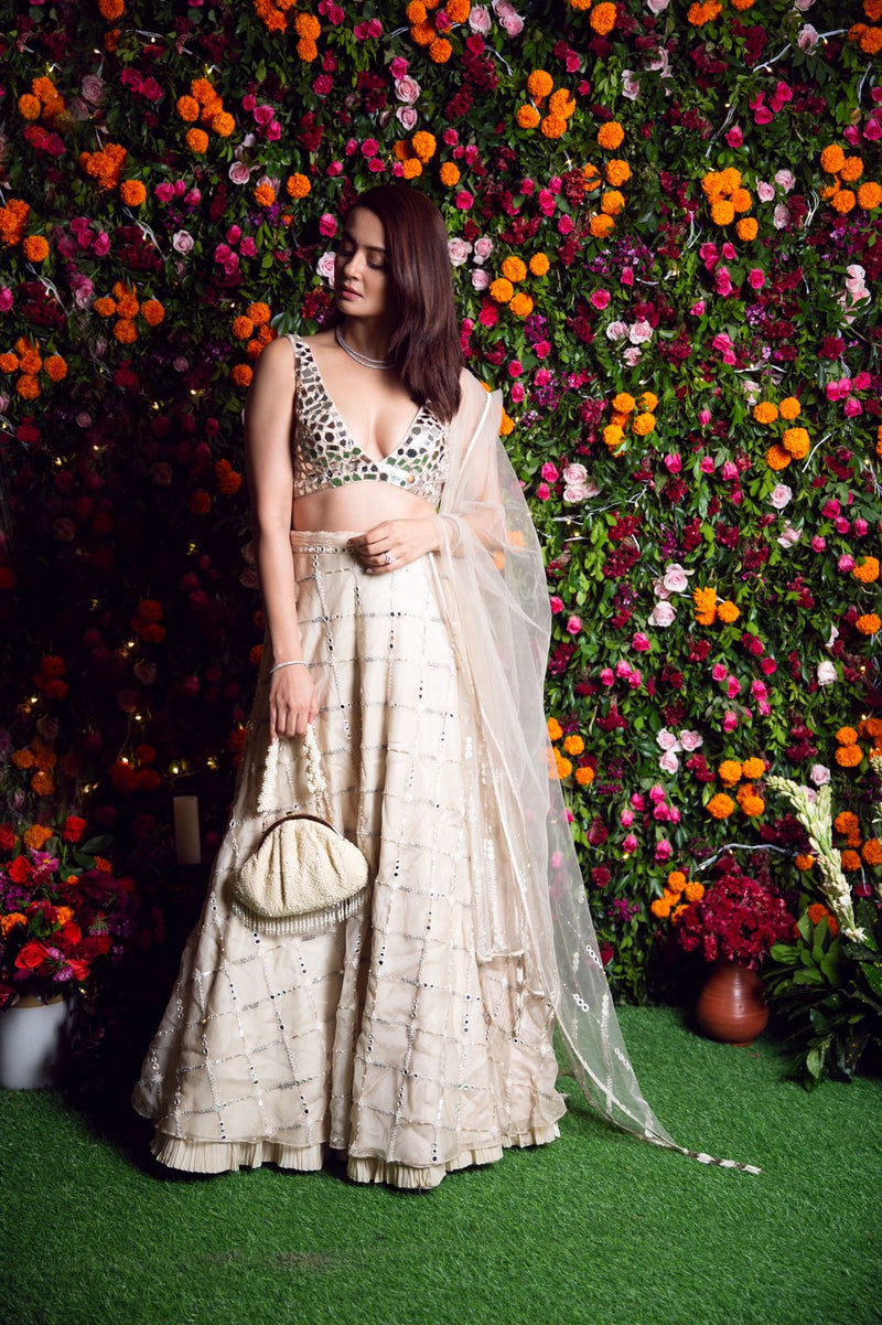 Surveen Chawla in our ivory mirror lehenga with mirror blouse.